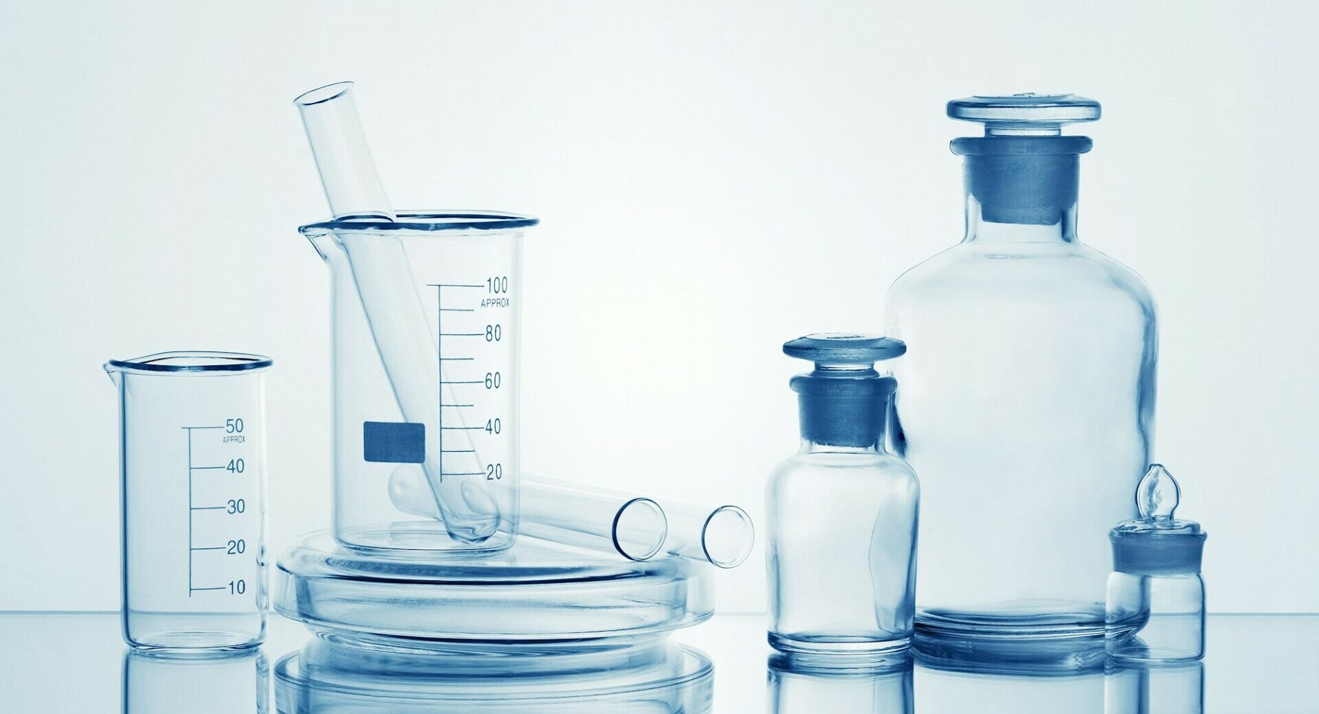 Laboratory Transparent Glassware on White